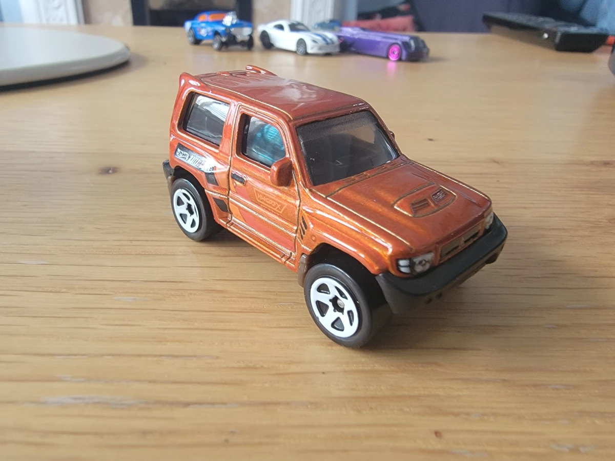 2024 Mitsubishi Pajero Evolution Orange: No Package: Image 2