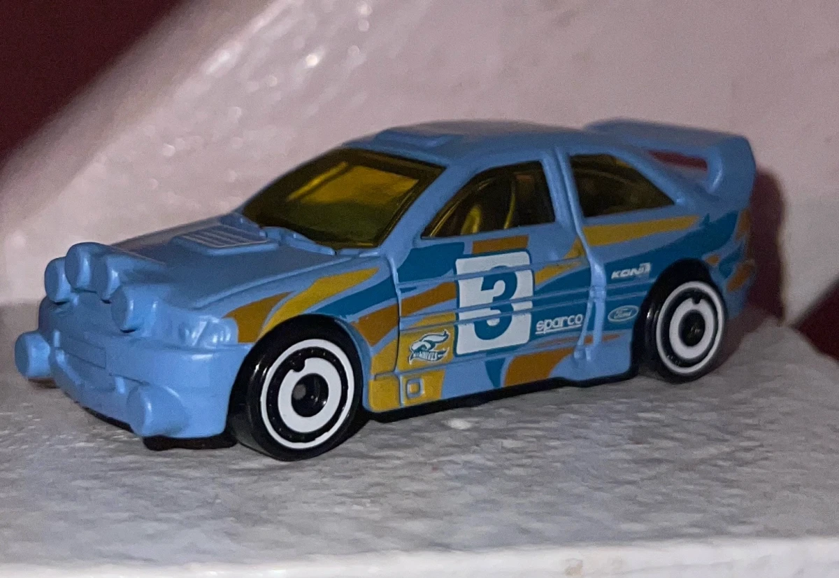 2026 Ford Escort Blue: No Package: Image 2