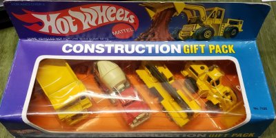 construction gift pack; cat dump truck,peterbilt cement mixer,construction crane, and front end loader