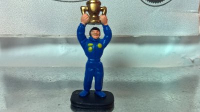 Micro Action Figure - Driver With Trophy