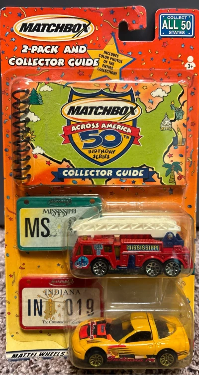 Extending-Ladder Fire Truck & 1997 Chevrolet Corvette