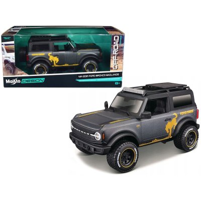 Ford Bronco Badlands Dark Gray Metallic With Gold Graphics And Roof Rack "Off-Road" "Maisto Design" Series